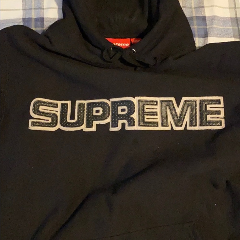 Supreme leather logo